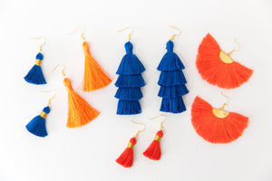 THE JULIA 1-1/4” deep orange tassel earrings