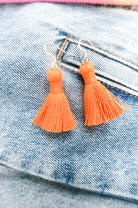 THE GABBY 1-1/4” orange silver hook tassel earrings